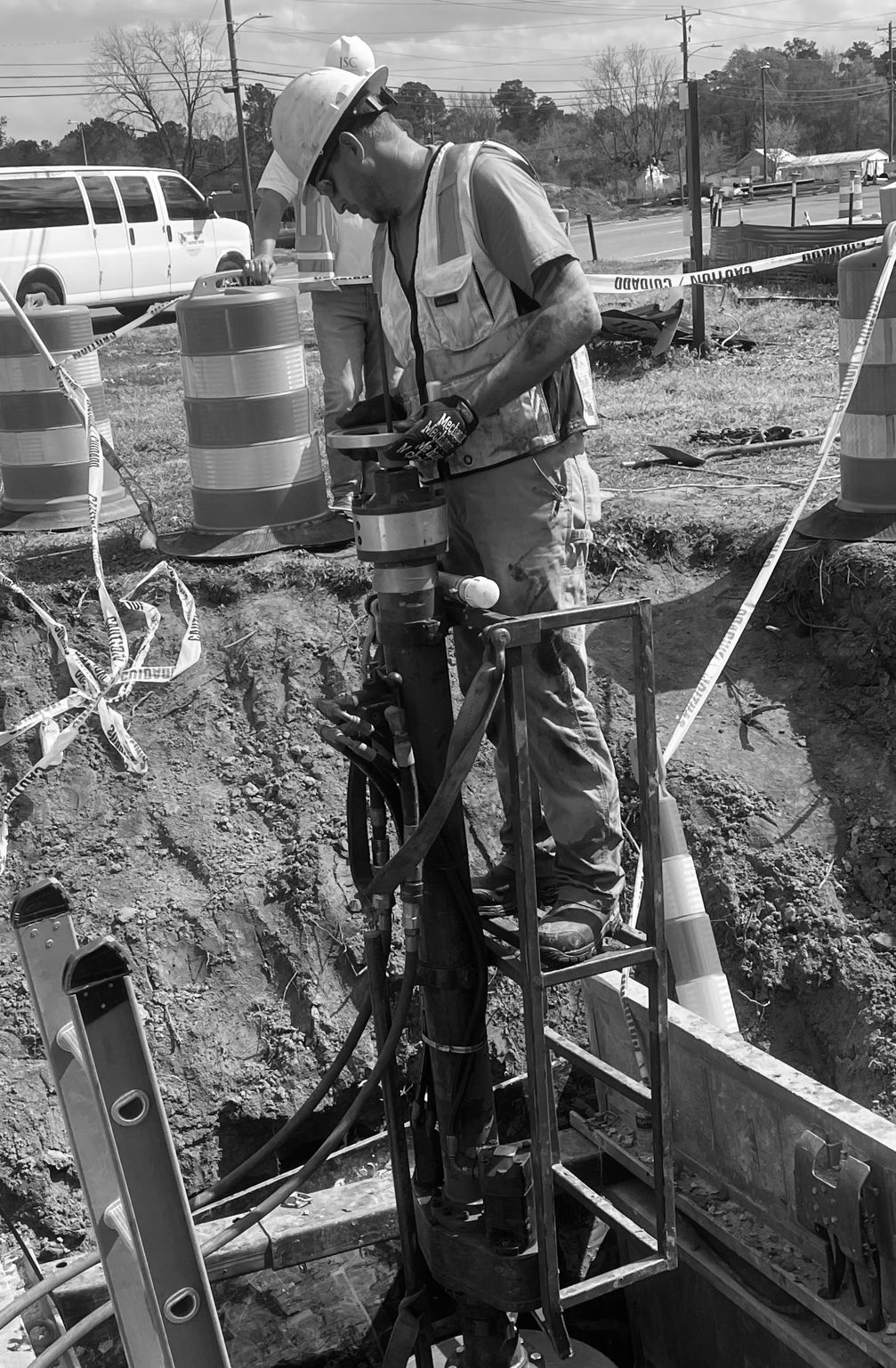 John installing a valve insert on a live water main